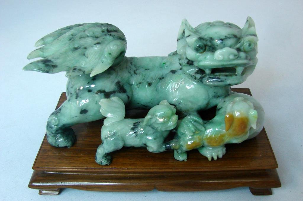 Vintage Chinese Jadeite Foo Dog high quality carvi: Vintage Chinese Jadeite Foo Dog high quality carving with two puppy foo dogs. Highly Polished with fitted wooden stand, 6.5" x 3.5". Not sure of age.