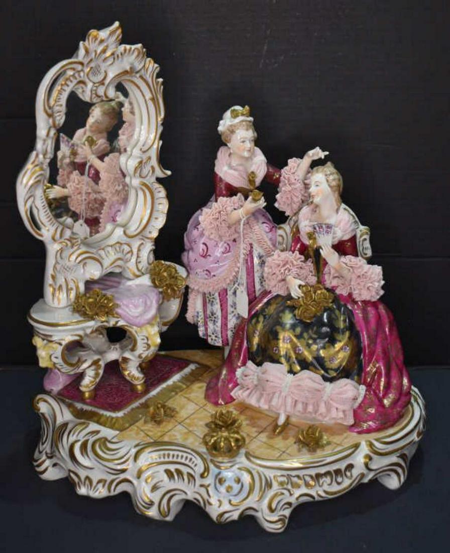 Dresden Porcelain Figural Group: Dresden Porcelain Figural Group. Impressive group depicting ladies in a sitting room. Includes removable mirror. In exceptional condition with only lacing in the back slightly damaged. Unsigned. 16"h.