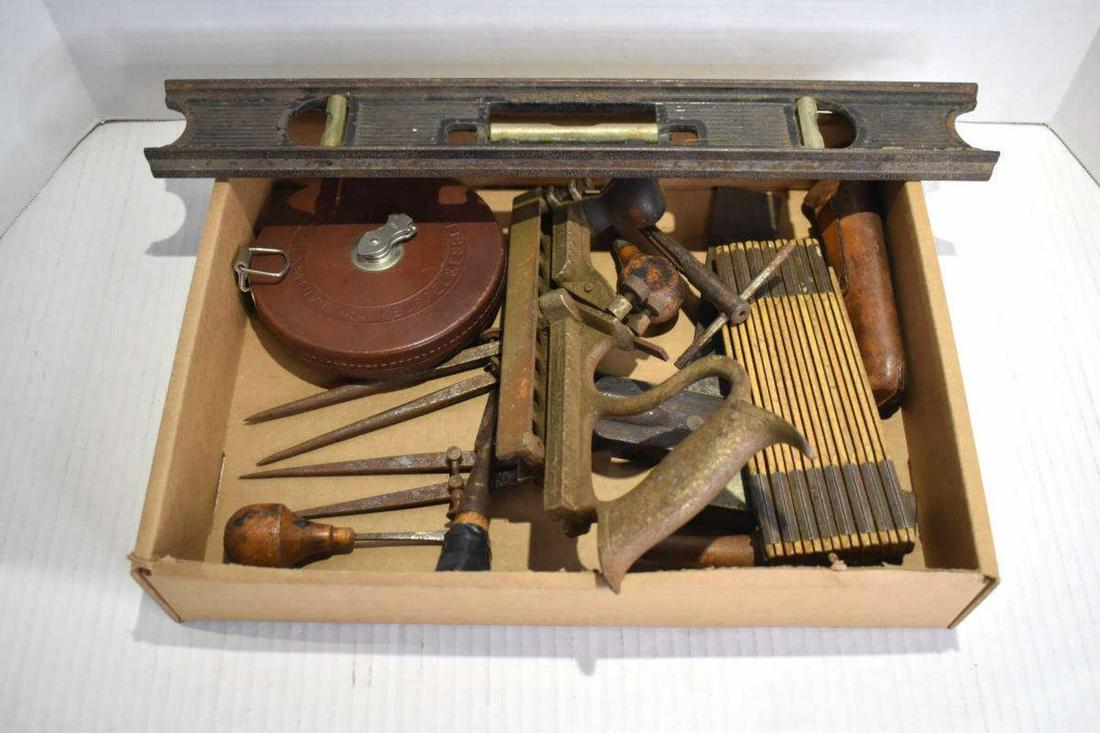 Group Of Vintage Tools: Group Of Vintage Tools. Consists of Stanley No.36 level. Measures 18" in diameter. Keuffel & Esser Co New York Leather Metal Tape measure. Couple of Protractors. 90 degree ruler. Stanley No.48 Tongue 