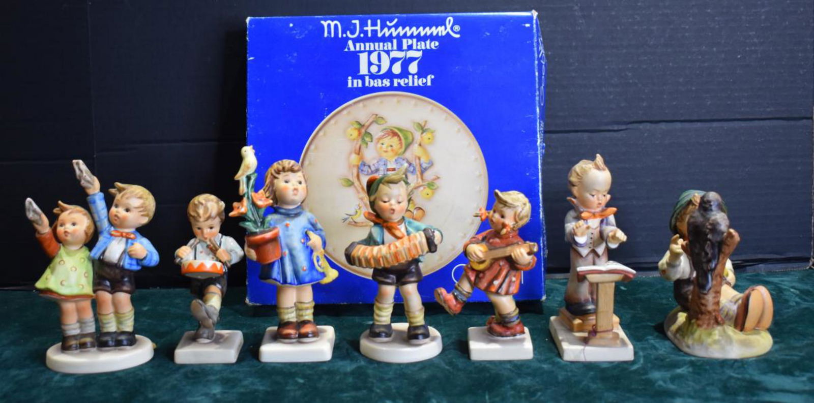 Group Of Hummels: Group Of Hummels. Total of 7 Hummels in the group. Sizes range from 4"-6" in height. Consists of Happiness. Congratulations. Little Drummer. Farewell. Band Leader. Accordion Boy. Sing Along. Also incl