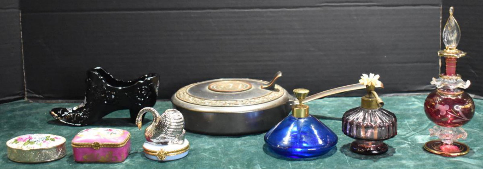 Group Of Collectibles: Group Of Collectibles. Total of 10 pieces of collectibles in the group. Sizes range from 1"-6 1/2" in height. Consists of 3 mini trinket boxes. 3 perfume bottles. hand painted porcelain high heel shoe