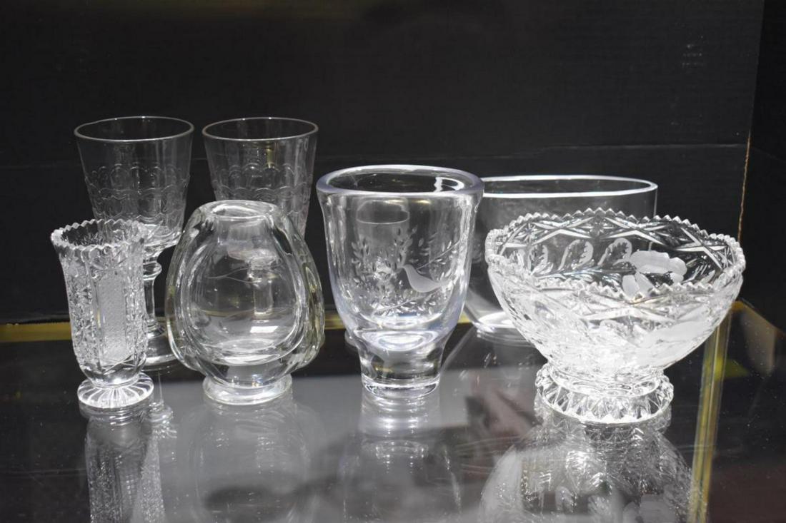 Group Of Glass Collectibles: Group Of Glass Collectibles. Consists of a pair Etched water glasses. Stands 6" in height. Floral etched cordial glass. Stands 4" in height. Cut glass vase. Measures 4 1/2" in height. Vase with floral