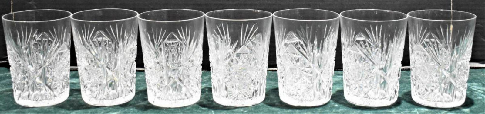 Group Of Cut Glass Cocktail Glass: Group Of Cut Glass Cocktail Glass. Total of 7 cocktail glasses in the group. Measures 4" in height. Cut glass cocktail glasses are in great condition.
