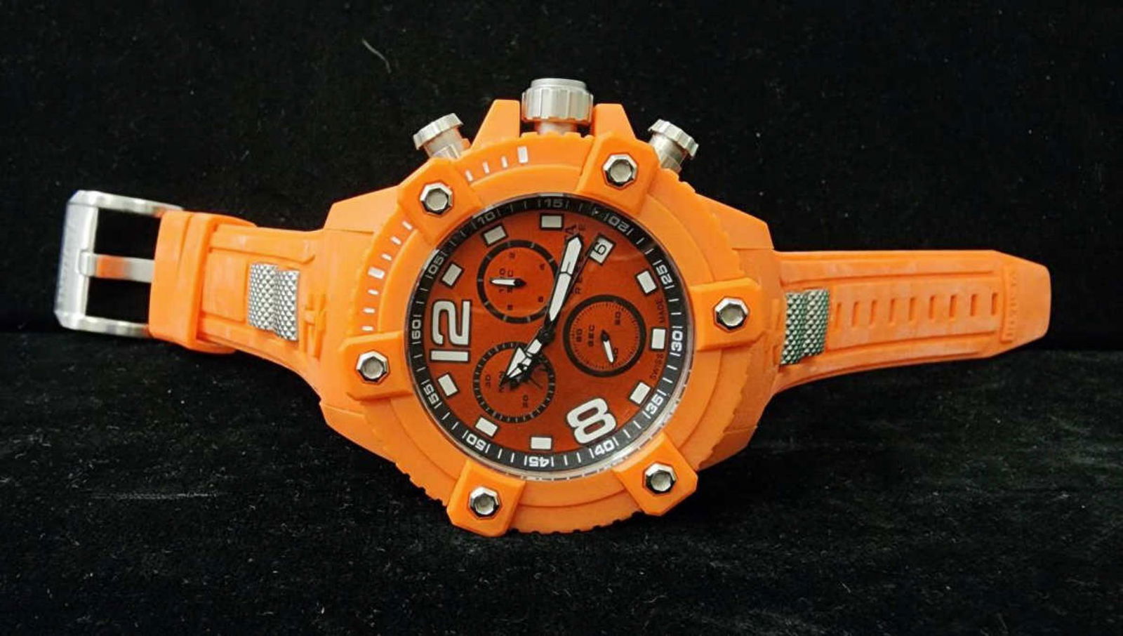 Men's Invicta Reserve Octane quartz watch: Men's Invicta Reserve Octane quartz watch, model 17291, featuring a 50mm case, orange dial with 3 sub-dials, quartz movement and orange polyurethane band.