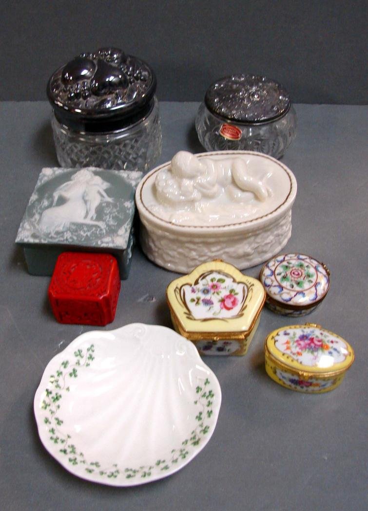 6 Trinket Boxes - Limoges, Belleek, 2 Dresser Jars: 2 Limoges Trinket Boxes, 1 hand painted unmarked, 1 Belleek Cherub, 1 Cinnabar, 1 Green unmarked Jasperware, 2 silver covered dresser boxes, shell dish.