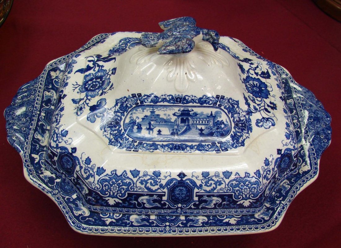 Antique Casserole, Stoneware Jugs, etc: Heavy pottery jug 7.25" tall, covered blue & white jar, blue speckled glazed covered dish (old chip see photo), Antique Blue & White Covered Casserole - stained interior, and a black metal candleholde