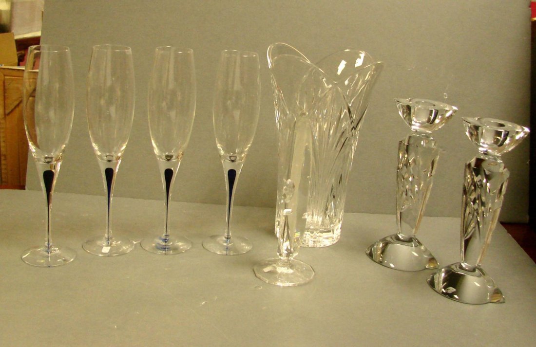 Crystal Lot: 4 Champagne, Vase, Candlesticks: Lot of crystal consisting of 4 Orrefors Crystal Champagne flutes, pair of crystal candle holders, vase, crystal prism with a Star of David. No chips.