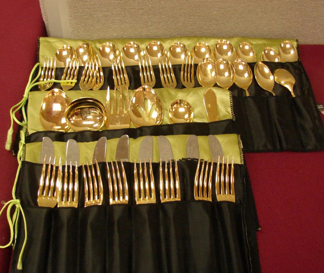 Gold Plated Flatware, Svc . for 8, & Geisha Figuri: Set of "Gold Imperial" plated flatware, service for 8 and a white ceramic Geisha Figurine - with flowers, missing one finger; flowers intact.