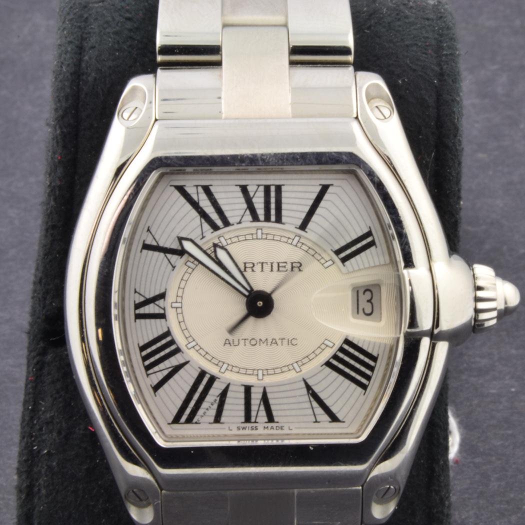 Cartier Mans Roadster Watch: Cartier Mans Roadster Watch. Automatic Large chronograph Model. In presentation box running and looks NEW. All papers and catalogs. Stainless Steel with extra leather band