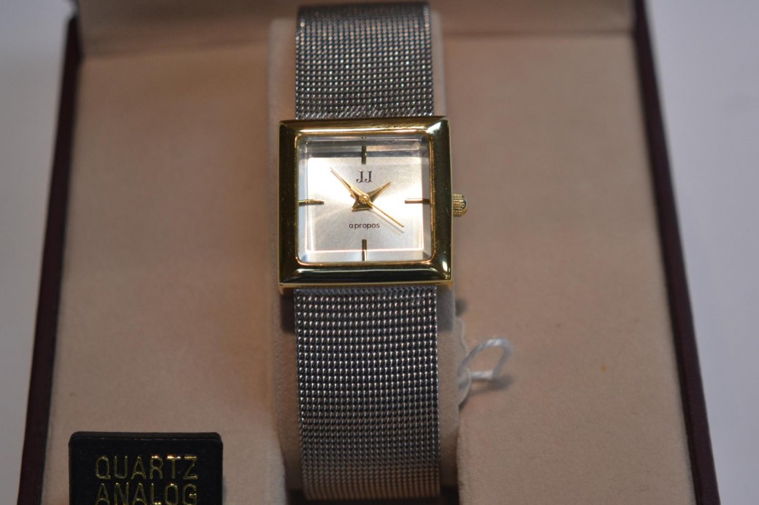 Jules Jurgensen Lady's Quartz Watch: Jules Jurgensen Lady's Quartz Watch. Two Tone mesh bracelet. Stainless Steel back. Looks NEW and in Original box. Running