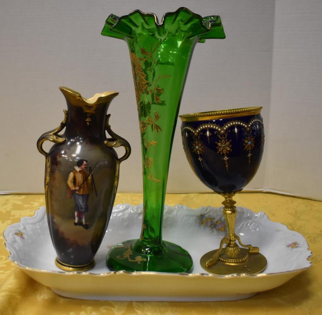 Group Of Collectibles: Group Of Collectibles. Total of 4 collectibles in the group. Consists of hand blown green tulip vase God flower pattern on the exterior of the vase Measures13" in height. Decorative Goblet. Stands 8"