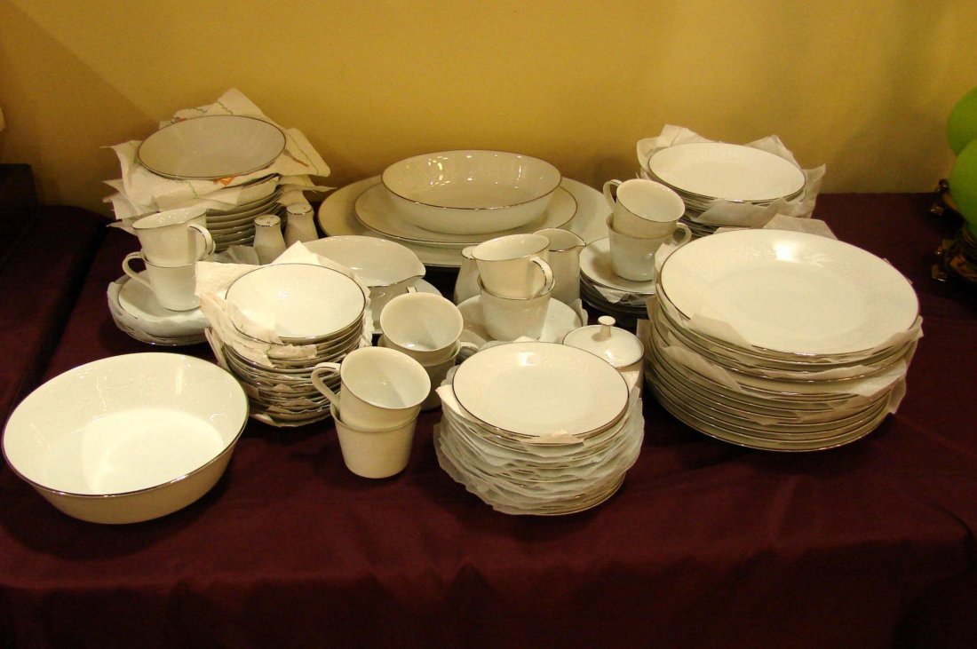 Noritake Reina China - Service for 12 + serving pc: Noritake Reina China - 12 ea. dinner, salad & bread plates, soup dishes, saucers, 10 cups, oval & round veg., gravy, 2 platters, 1 salt, 2 peppers. No chips that we see.
