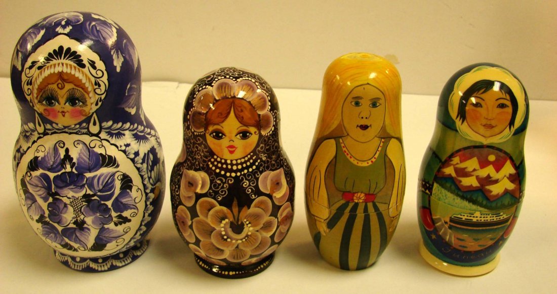 4 Sets Matryoshka - Russian Nesting Dolls: 4 Sets Matryoshka - Russian Nesting Dolls. tallest is 6 1/2" and has 8 dolls, the other three all of 5 dolls. All hand painted in Russia.