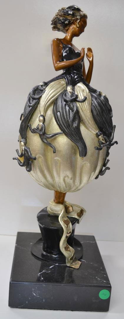 Bronze Statue by Erte "Tuxedo" Black Marble Base: ERTE - Romain De Tirtoff (1892-1990) Russian/French - Ltd. Ed Bronze Sculpture of a Woman titled "TUXEDO" 314/375. 21" high. COA from Chalk & Vermilion Fine Arts.