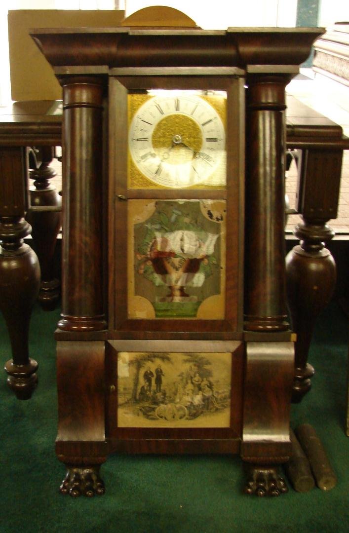 Antique Clock - Empire w/lion legs - c1850's: Antique Clock - Empire style with lion legs - c1850's. Not working. 32" long x 19" wide. Weights and original face are present; key is not. We can find no labels inside.