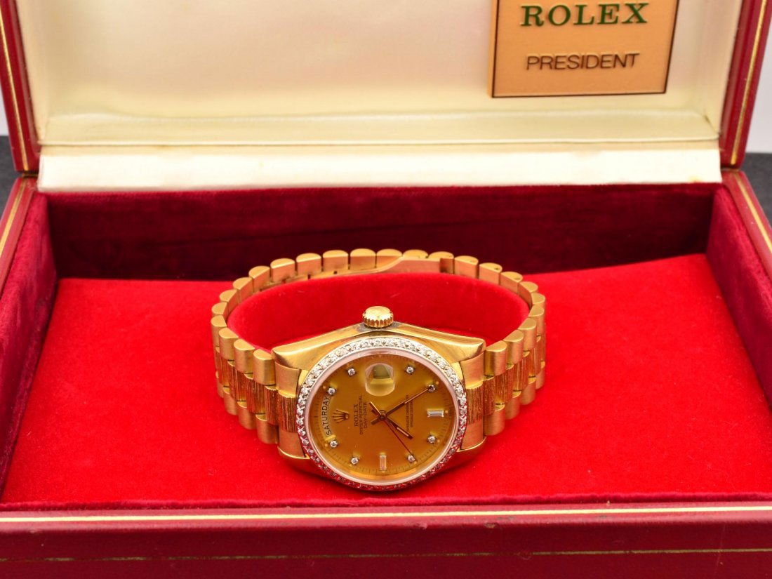 18k yg Mans Rolex Diamond Dial President: 18k yg Mans Rolex Diamond Dial President. Oyster Perpetual Day-Date with Bark finish bracelet. Model # 18078. 1982 in Original presentation box with papers. 137.5gr