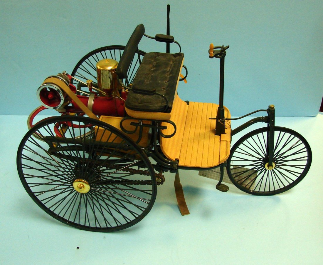 Franklin Mint 1886 Benz 1:8 scale Automobile: A 1:8 scale model of the Benz 1886 Patent Motorwagon by the Franklin Mint, die-cast, hand assembled from over 100 parts, with Patentschrift No. 37435.