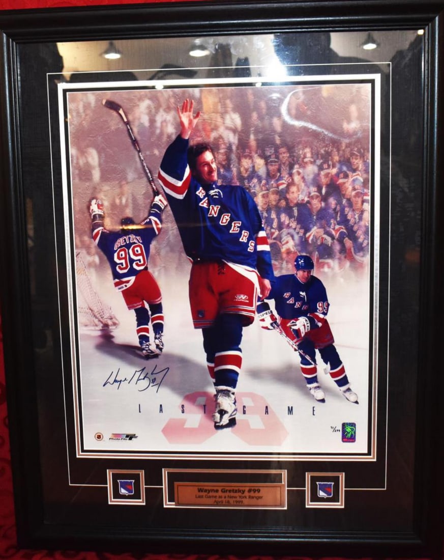 Wayne Gretzky Signed Frame Print: Wayne Gretzky Signed Frame Print. Measures 24"x30 1/2". Last game photo of Wayne Gretzky with the New York Rangers. Authenticity by WGA located in lower right hand corner. Signed and numbered 71/299 l