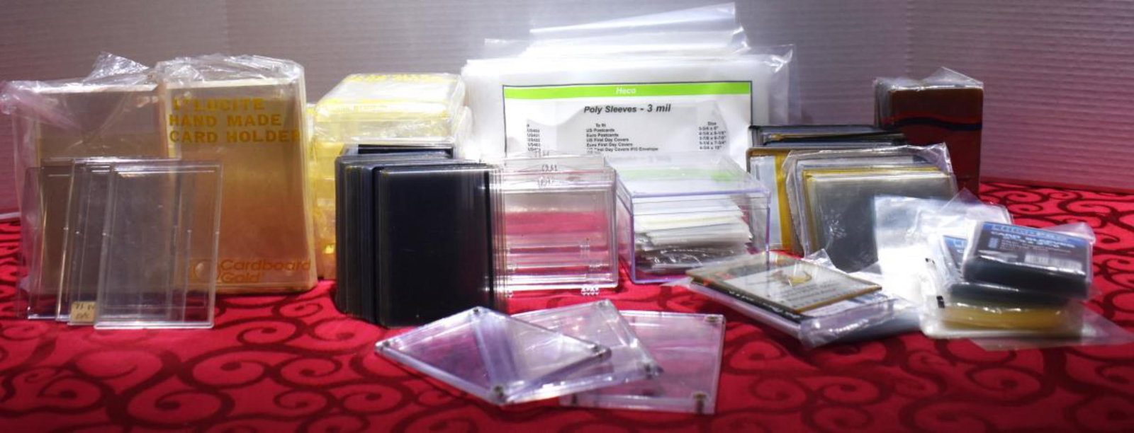Lot of Sports Card Supplies: Lot of Sports Card Supplies, includes thick acrilic holders, top loaders, card sleeves, Heco poly sleeves, and case's.