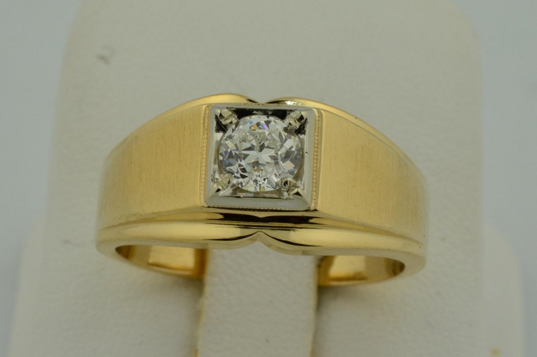 14k yg Mans 1/2 ct Diamond Ring: 14k yg Mans 1/2 ct Diamond Ring. .55ct European cut Diamond in the center of brushed side ring. Clarity I1, Color I, size 10, 8.0gr