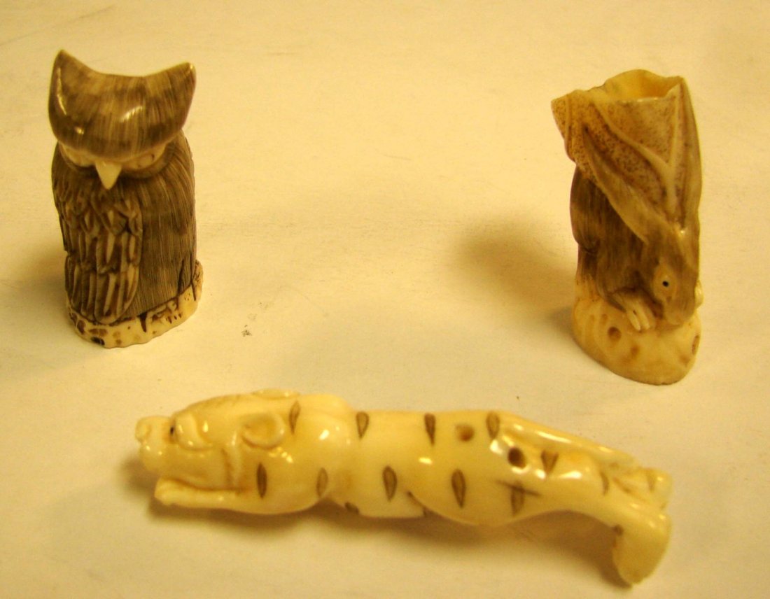 3 Ivory Bone Netsuke - Rabbit, Tiger & Owl, all: 3 Ivory or Bone Netsuke - Rabbit, Tiger (3.25" long) & Owl, all signed.
