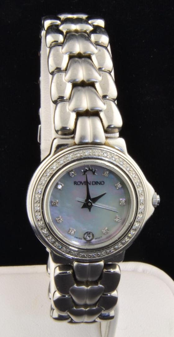 ROVEN DINO Swiss Lady's Watch: Roven Dino Swiss Lady's Watch. Stainless steel with mother of pearl dial and second hand. 24mm wide case.
