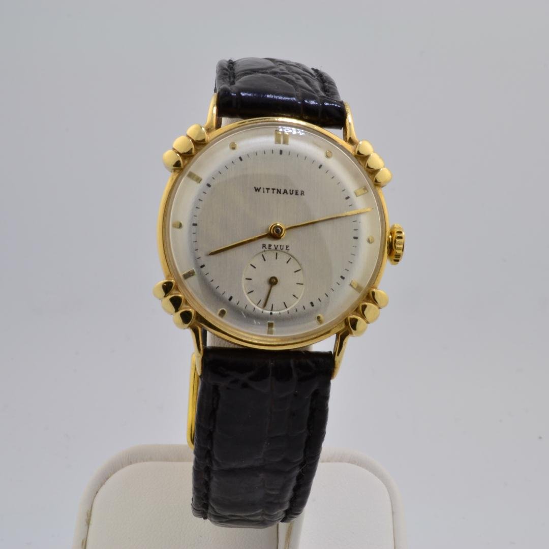 14k yg Mans Wittnauer Revue Dial Watch: 14k yg Mans Wittnauer Revue Dial Watch. 1940 Double dial style watch with a leather strap. 29mm case. 17.4gr