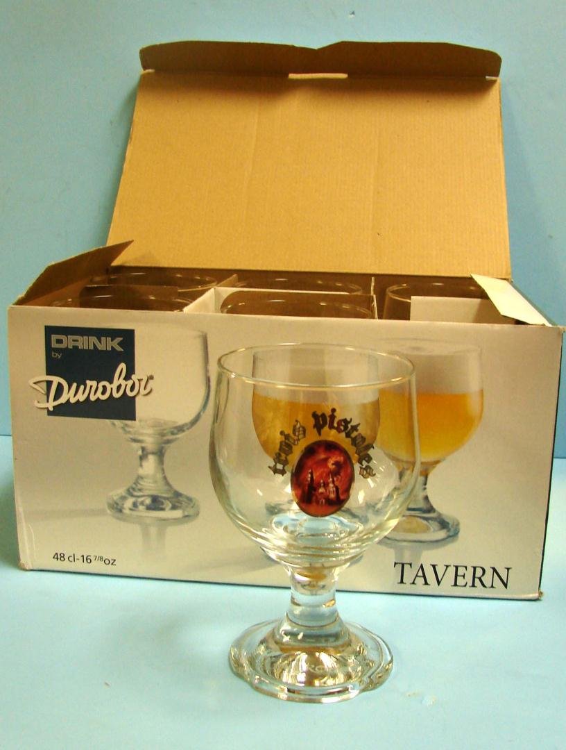 6 Trois Pistoles Tavern Glasses Unibroue by Durobo: 6 New Trois Pistoles Tavern Glasses marked Unibroue made by Durobor. One of the most unique brewers in Canada, Unibroue, makes beers that are styled after Abbey beers. Trois Pistoles is a strong, dark