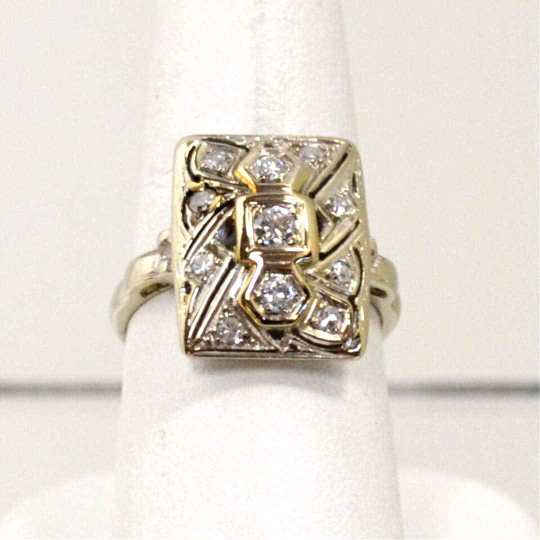 Vintage 14kwg diamond ring .36ctw: Lady's vintage 14kwg diamond ring, single and full cut prong set diamonds in a square setting .36ctw, finger size 8. 4.7gm