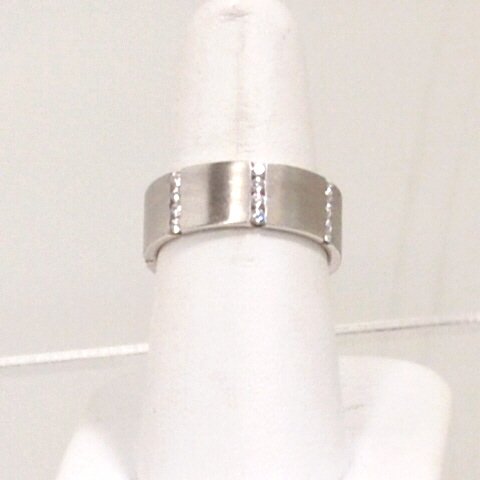 Man's 14kwg diamond wedding band .40ctw: Man's 14kwg diamond band with 5 rows of channel set diamonds .40ctw, alternating with satin finish band, 7mm wide and finger size 8. 9.4gm