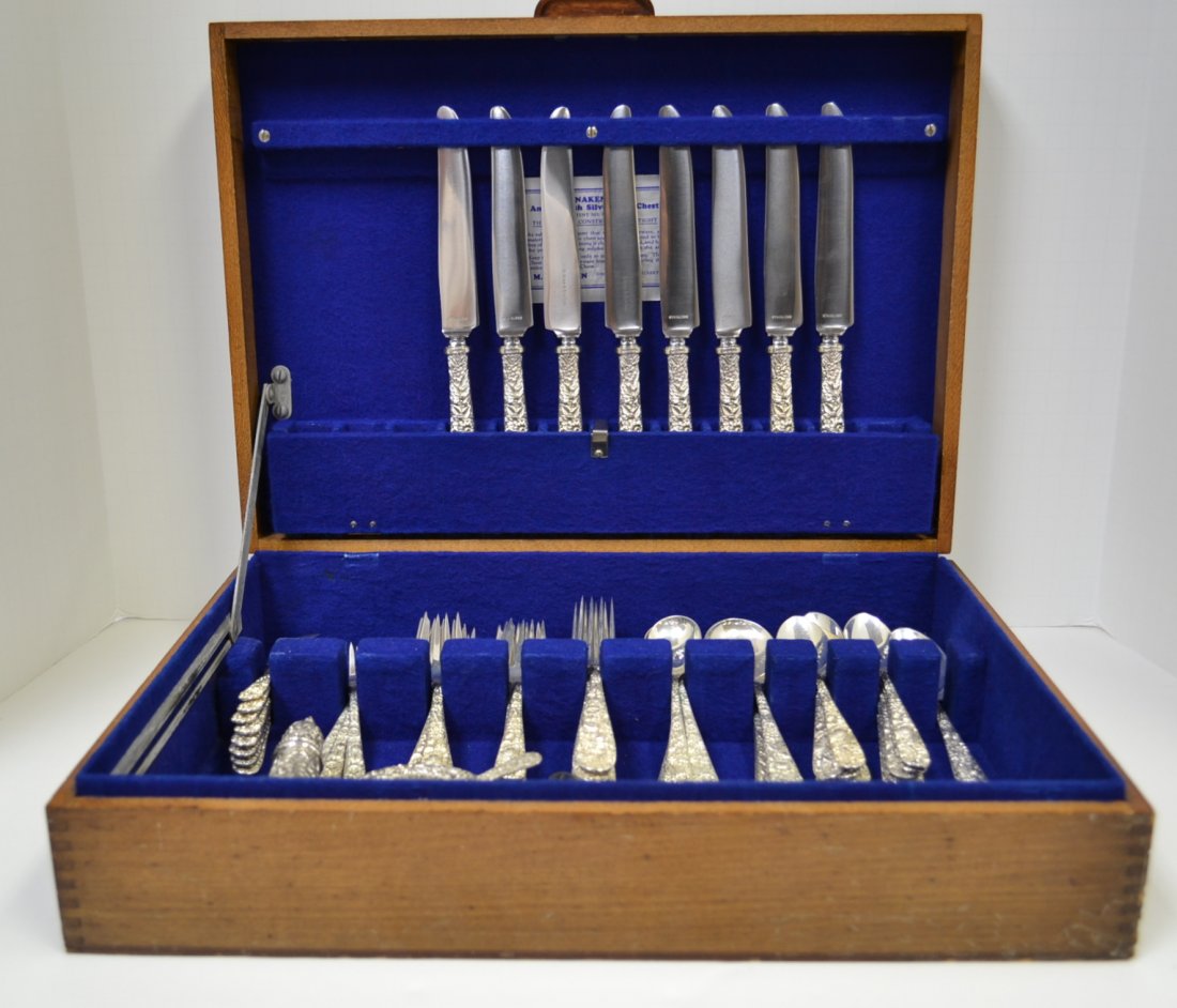 80 pc S Kirk & Sons Repousse Sterling Flatware: 80 pc S Kirk & Sons Repousse Sterling Flatware by Kirk Steiff. 8 piece dinner size setting plus extras. Circa 1924. 78.5 oz. total. weight. Comes in a Naken's wooden anti-tarnish silverware chest.