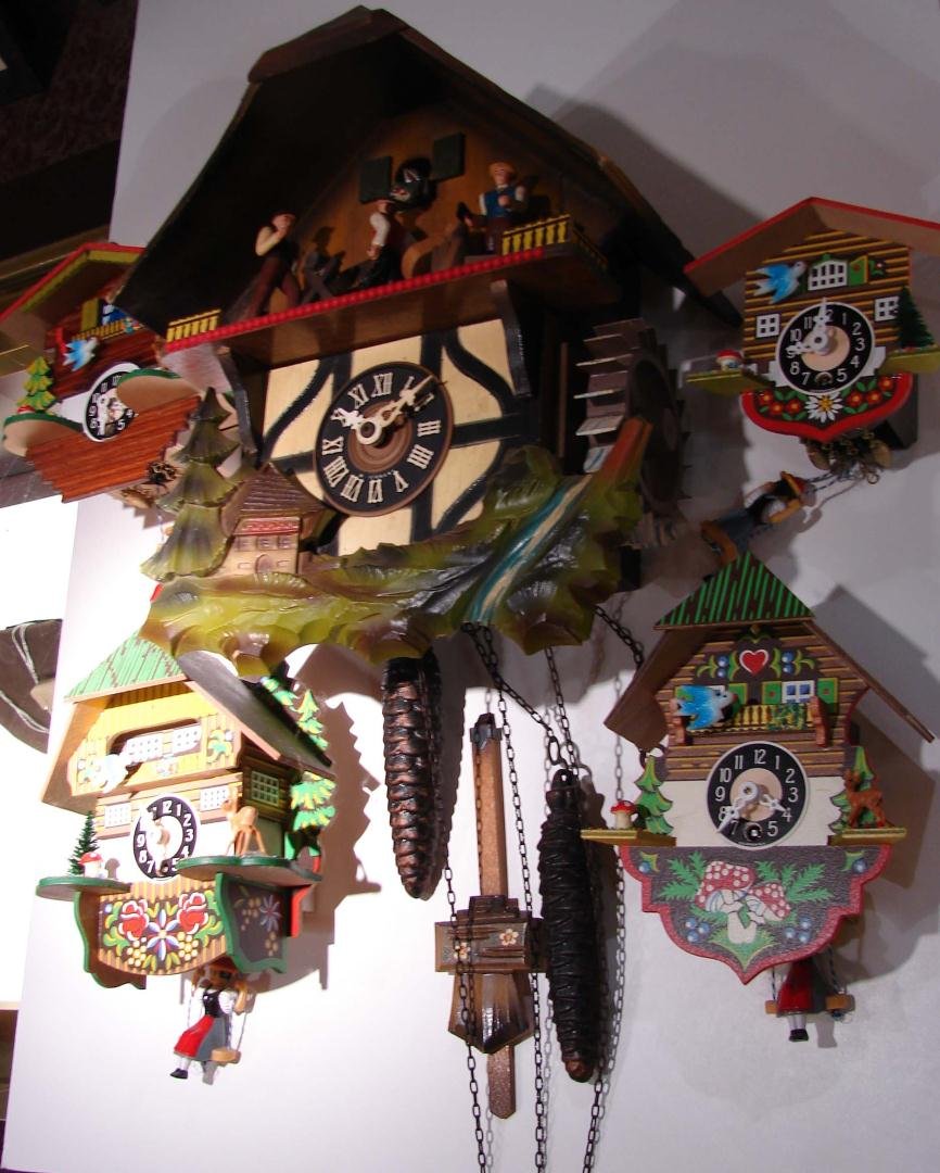 5 Colorful German Cuckoo Clocks: Colorful German Cuckoo Clock and 4 small German clocks, not tested.