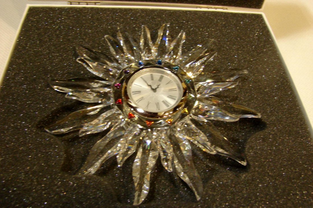 Swarovski Solaris Crystal Clock: Swarovski Solaris Crystal Clock, original box, like new, new battery.