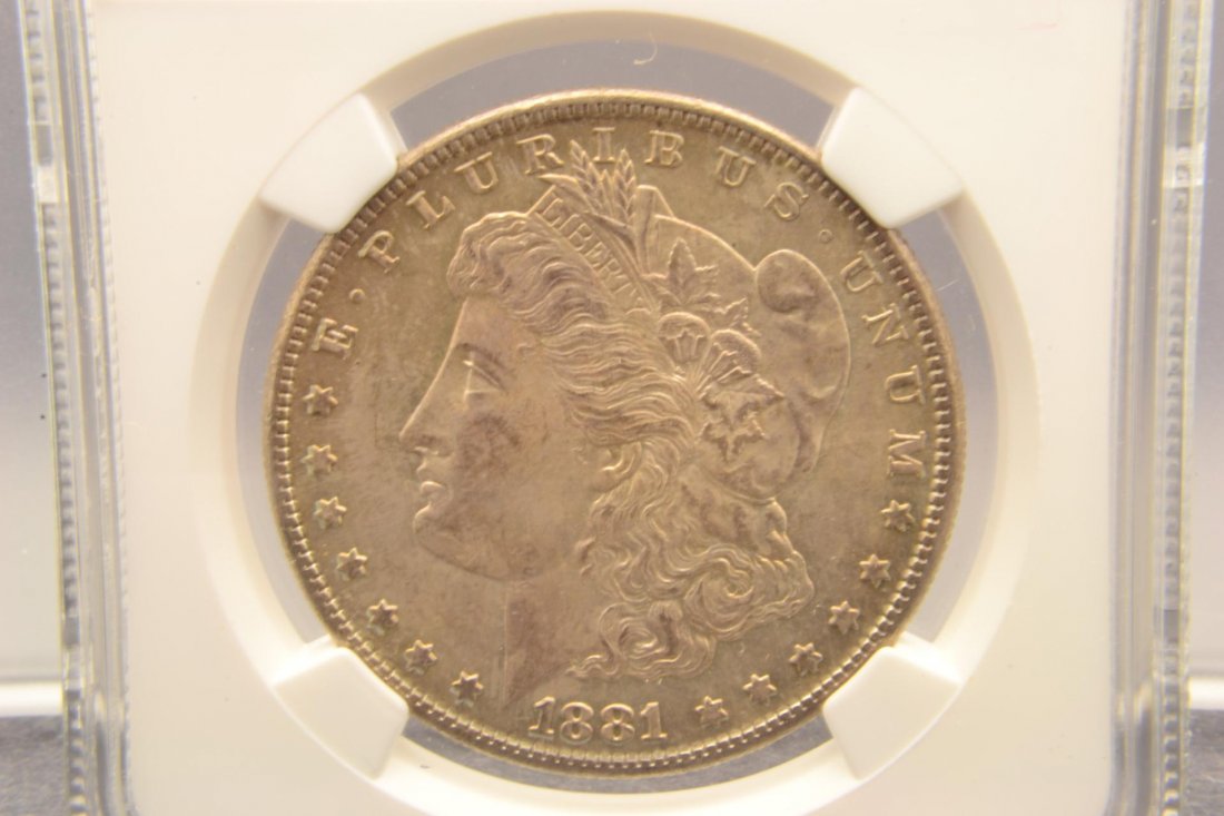 1881-S $1 Morgan Silver Dollar NGC MS 65: 1881-S $1 Morgan Silver Dollar NGC MS 65, nice golden toning