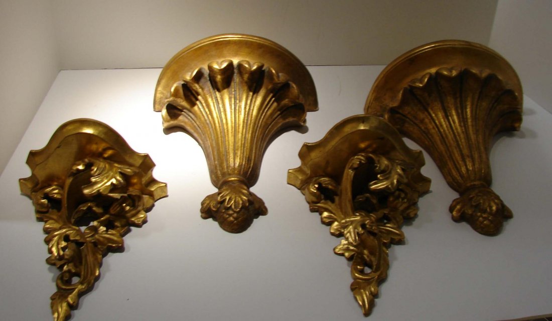2 Pair Wall Sconces - 10" and 8": 2 Pair Gold Wall Sconces - 10" are heavy painted plaster and 8" are light weight wood. Like new.,