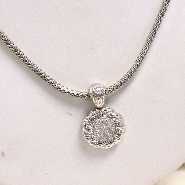 Sterling Diamond Pendant John Hardy: Sterling diamond pendant by John Hardy with circle of pave diamonds .40ctw, floral design with 24 wheat chain. 1.5oz"