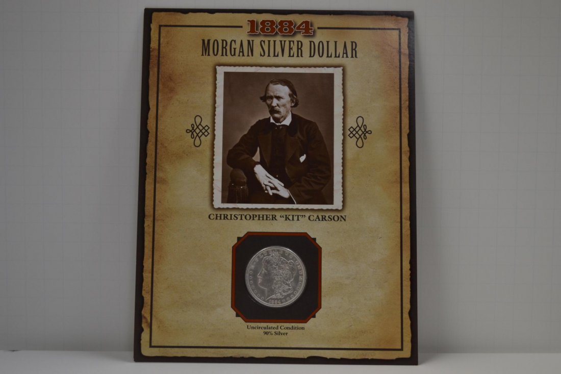 1884 $1 Morgan "Kit" Carson Cache with Stamp UNC: 1884 $1 Morgan Christopher "Kit" Carson Cache with Stamp UNC