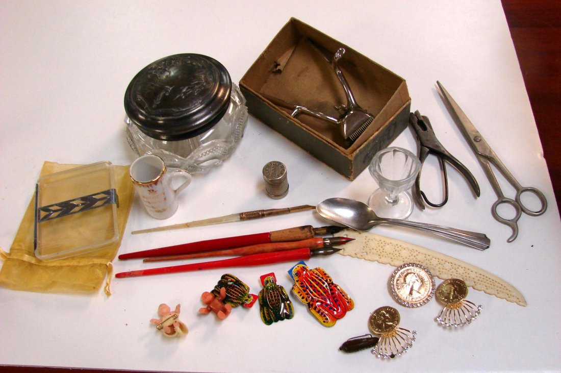 Antique Lot: Quill Pens, Ivory Ltr. Opener, Ticket: Antique Lot: 4 Quill Pens, Glass Dresser Jar with Silver Plate Lid, Ticket Punch, Clippers, tiny baby dolls, clickers, eye cup, medicine spoon, clear plastic cigarette case, tiny dice, ivory letter op