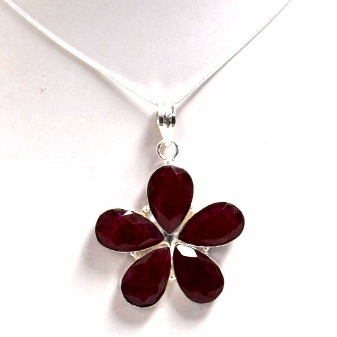 Ruby Floral Necklace in Sterling Silver: Ruby necklace with five pear shaped natural rubies, floral design, each measuring 20x13mm, bezel set with 20" snake chain.