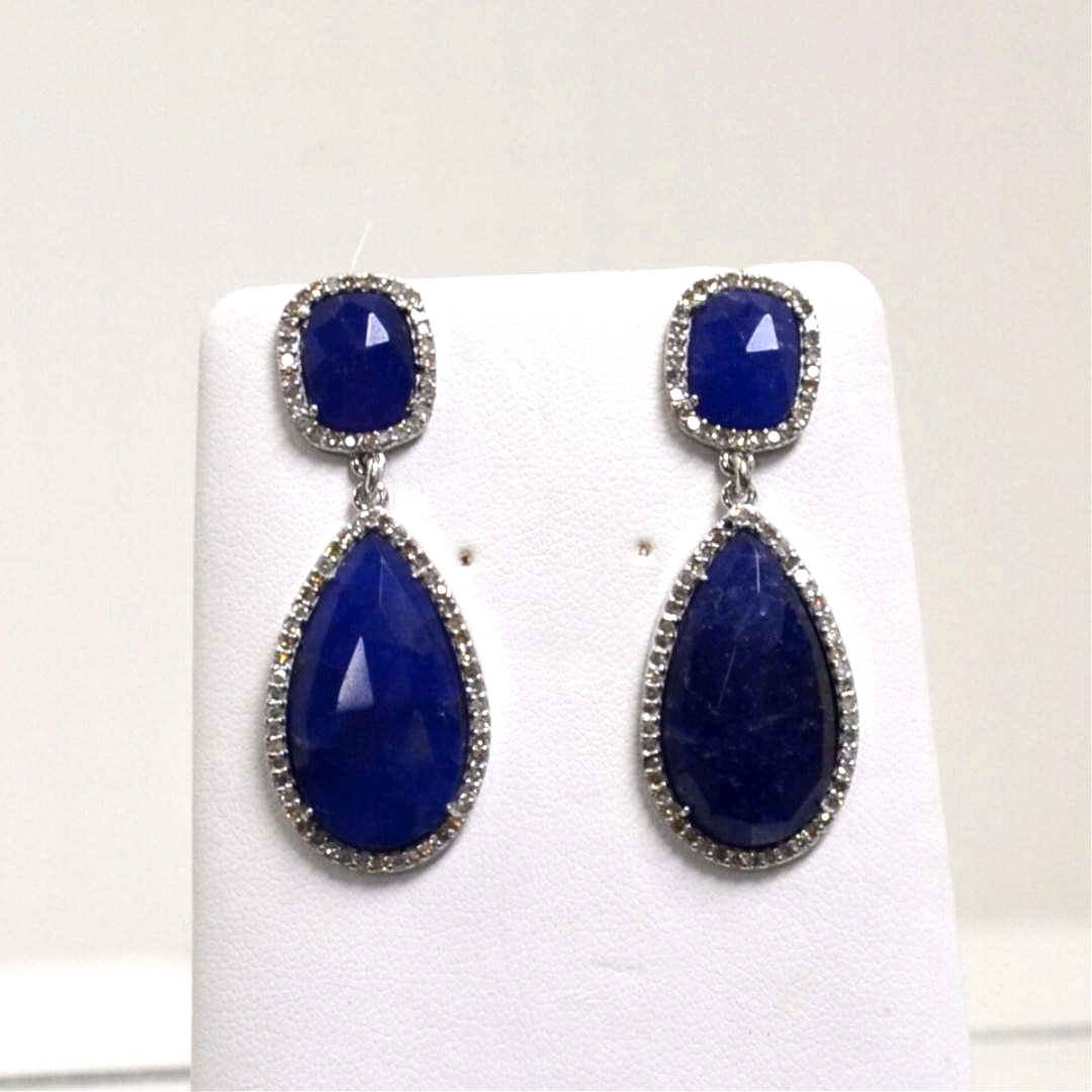 14kwg Chalcedony & Diamond Earrings: Lady's 14kwg chalcedony and diamond earrings with pear shaped chalcedony measuring 22x12mm along with cushion shape measuring 10x7mm, surrounded in prong set diamonds 1ctw and 11/2 in total length. 10