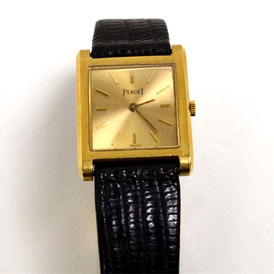 Man's 18kyg Piaget Wrist Watch: Man's vintage 18kyg Piaget watch with gold stick dial, mechanical movement, square case measuring 23x23mm excluding lugs and black leather band.
