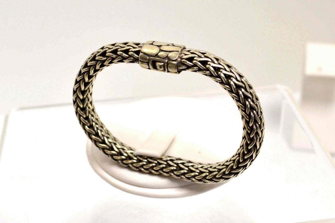 Sterling Kali Bracelet John Hardy: Sterling Kali bracelet by John Hardy with serpentine woven wheat design hallmarked JH 925, 7.5" in length, 8mm in width.