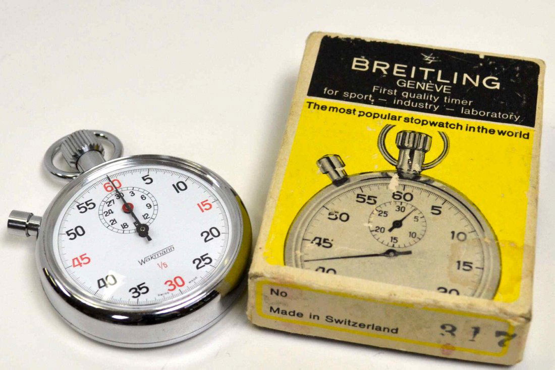Breitling Stop Watch: Vintage Breitling stop watch with wakmann dial, black hand for seconds, red hand for sundial minute register and in like new condition with original box.