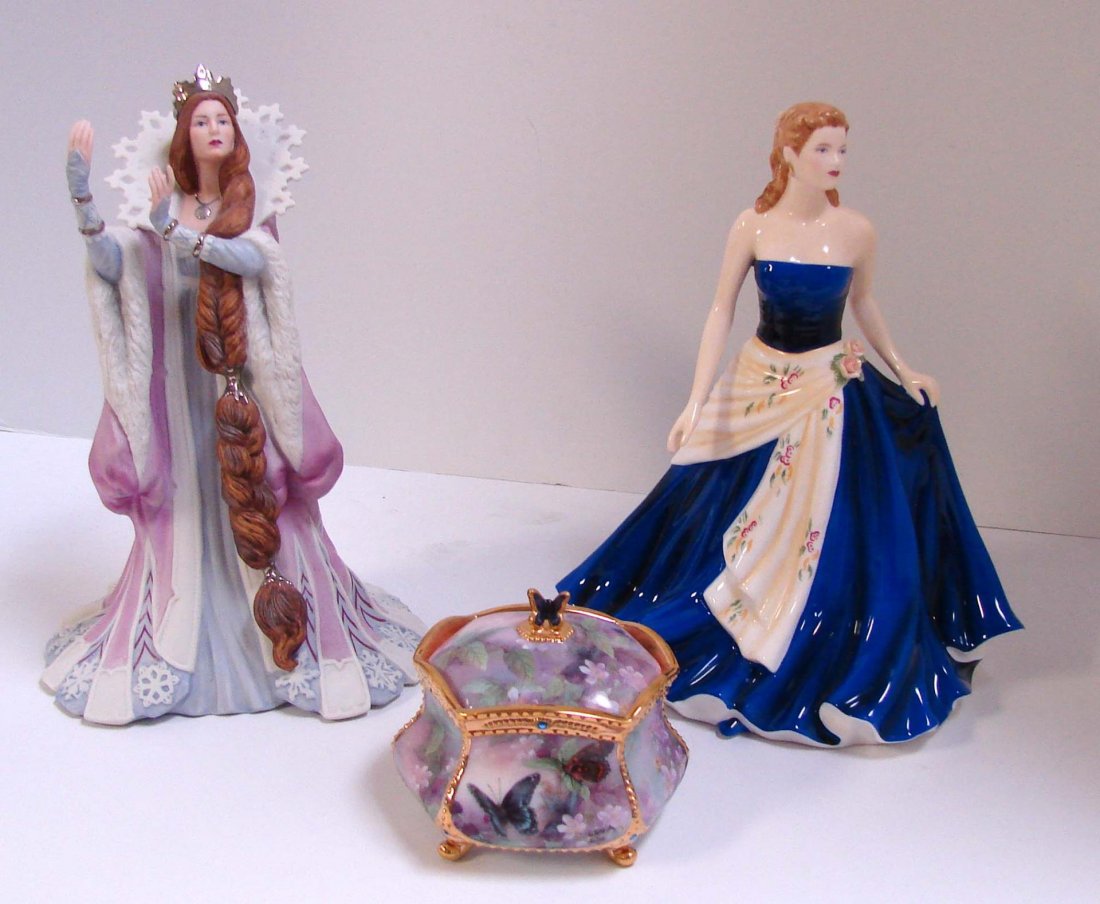 Royal Doulton & Lenox Figurines, Lena Liu Music Bo: Royal Doulton Pretty Ladies Figurine "Olivia", Lenox Figurine "The Snow Queen", Lena Liu Flights of Fancy Music Box, plays Wind Beneath My Wings. NOTE: Lenox figurine has a broken thumb (We did not no