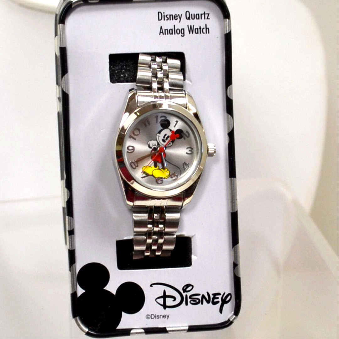 Mickey Mouse & Pendant Watch: Mickey Mouse watch with quartz movement and Rolex like link band. Also quartz pendant watch approx. 2" in length with floral cross on reverse side and 28" link chain.
