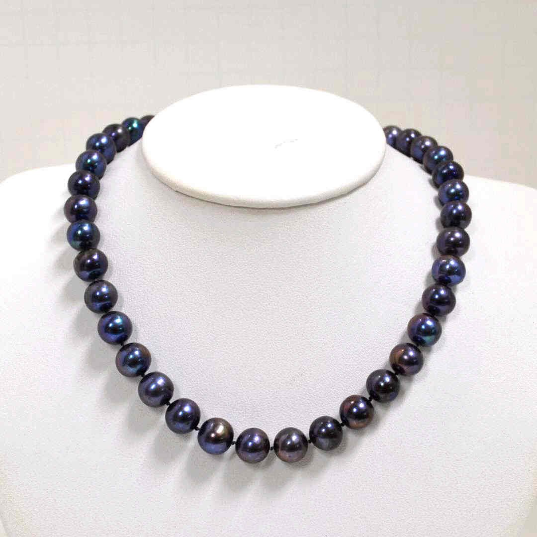 Tahitian Eggplant Pearl Necklace: Tahitian pearl necklace with 10mm round eggplant and black pearls, single knotted with 14kyg clasp, 18" in length.
