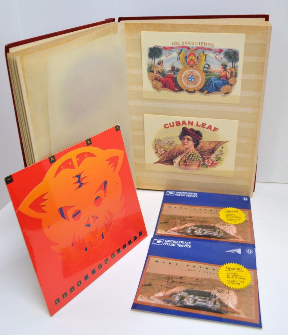 Album of 41 Cigar Box Top Labels and Postcards +: Album of 41 Cigar Box Top Labels, 2 unopened 1997 Mars Pathfinder postcards, and a 1998 Year of the Tiger stamps (stockbook)