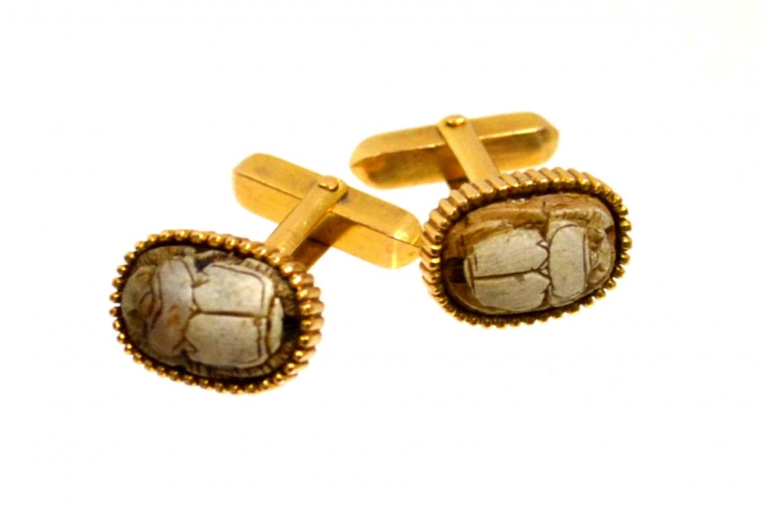 18kyg Scarab Cufflinks: 18kyg scarab cufflinks, beige color, hand carved soapstone, measuring 17x12mm with ribbed edges.12gm