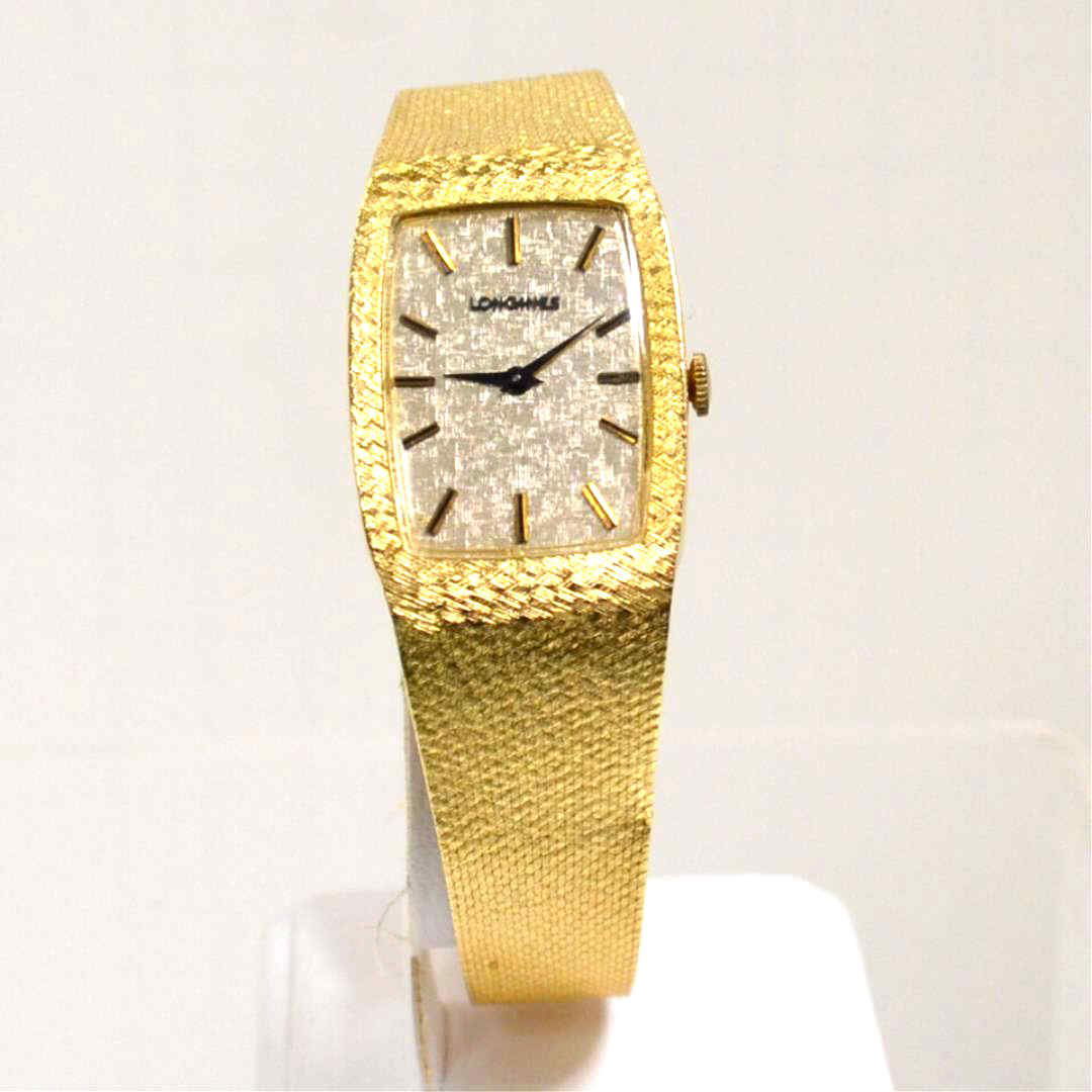 Man's 14kyg Longines Watch: Man's vintage 14kyg Longines watch with linen stick dial, black hands, 35X25mm case, mechanical movement, mesh band and in good running condition. 48.8gm