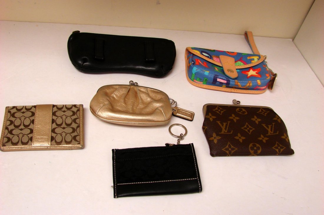 Dooney & Bourke, Coach, L. Vuitton Pouch Wallet: Assortment of small pouches: Dooney & Bourke blue with colorful decoration, Coach gold wallet, gold change purse and black pouch w/key ring, L. Vuitton Pouch, Levenger leather pouch; all in very good